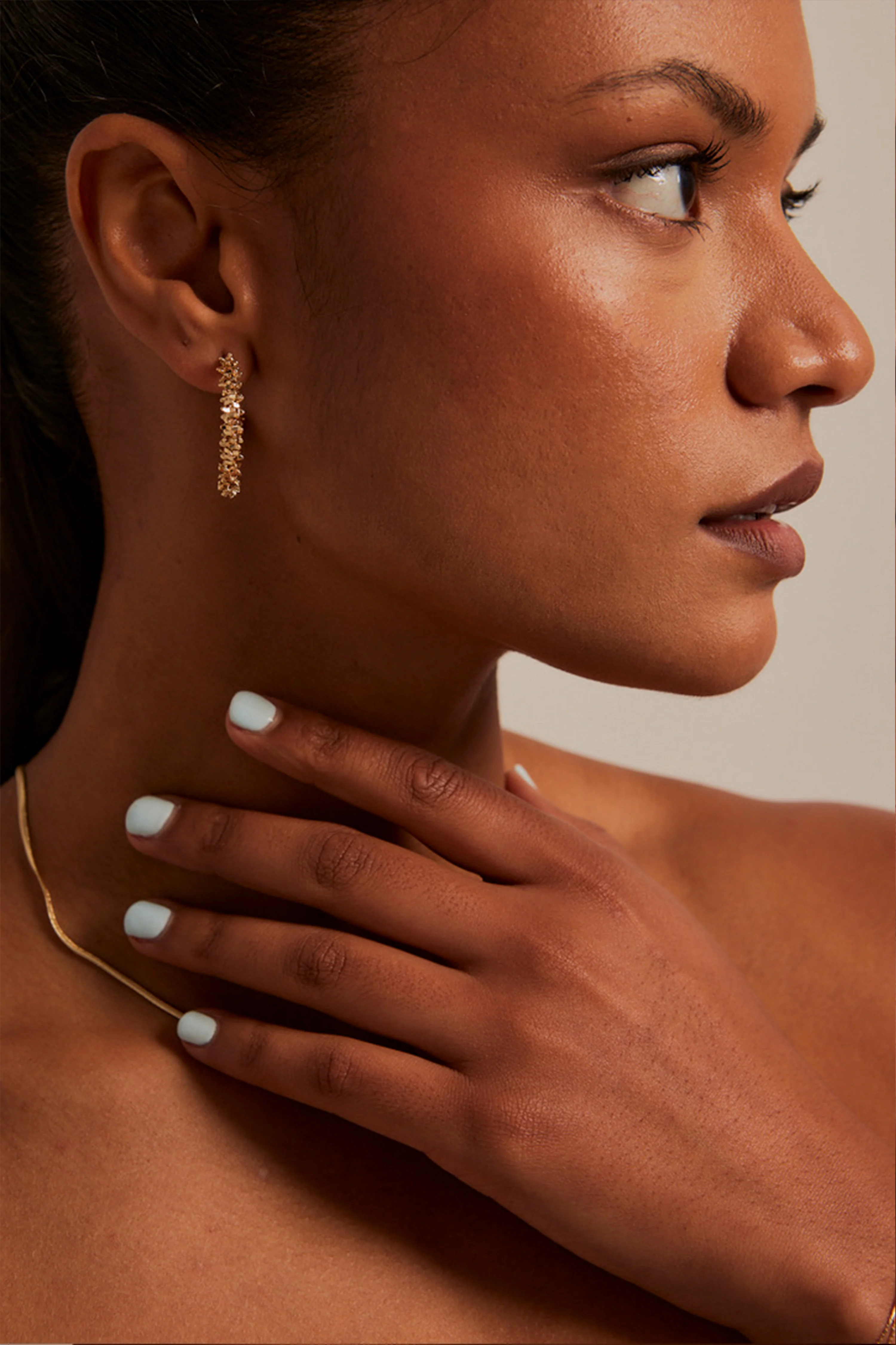 Mini Celestial EOL Gold Hoop Earrings - Image 2