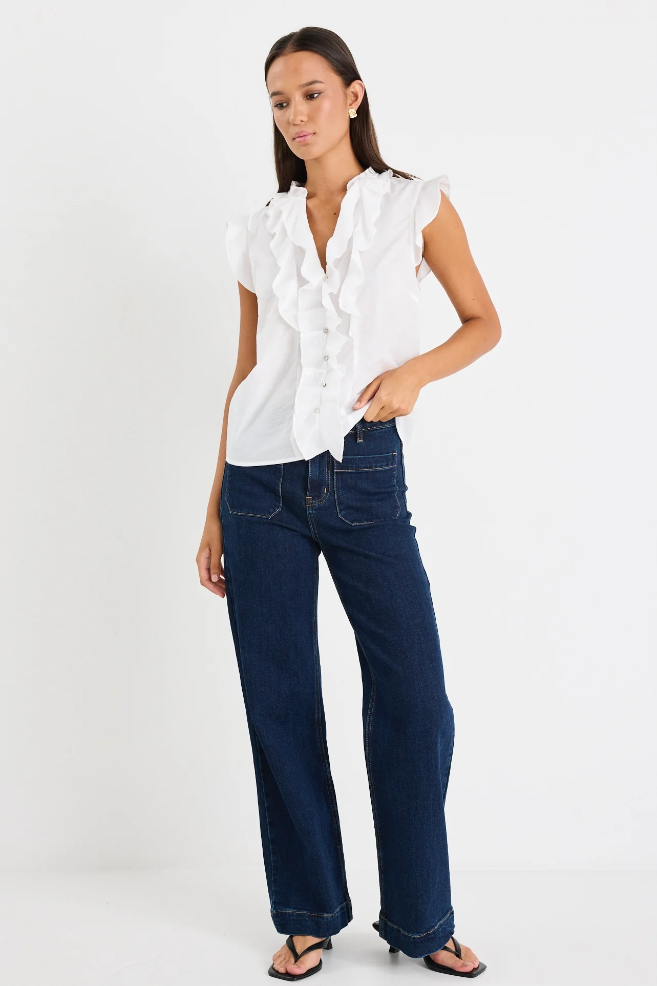 Ritzy Ivory Ruffle Front Sleeveless Top - Image 4