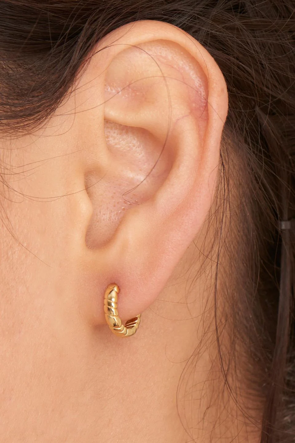 Smooth Operators Gold Twisted EOL Huggie Earrings - Image 2