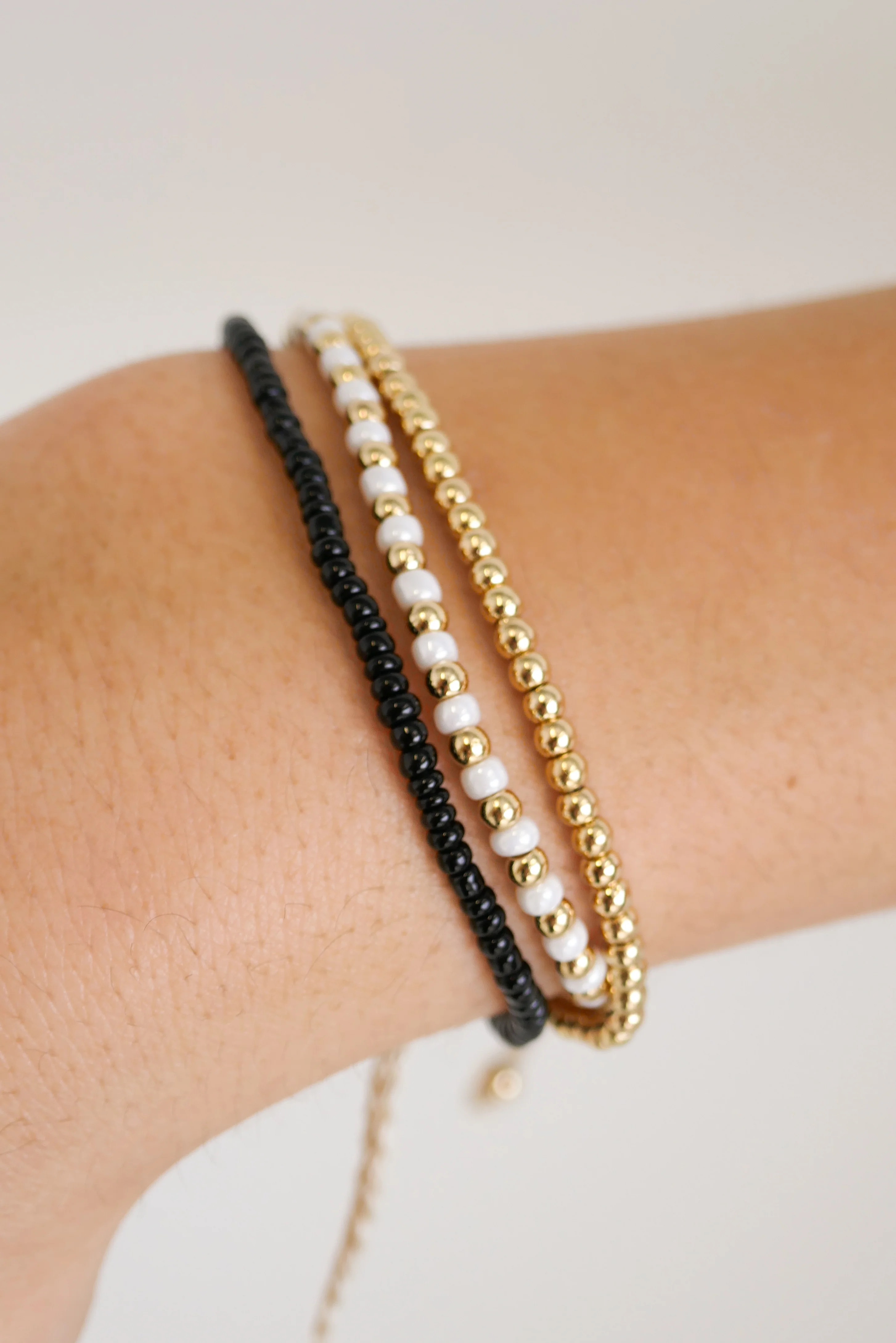 Triple Bead EOL Gold Black White Bracelet - Image 3